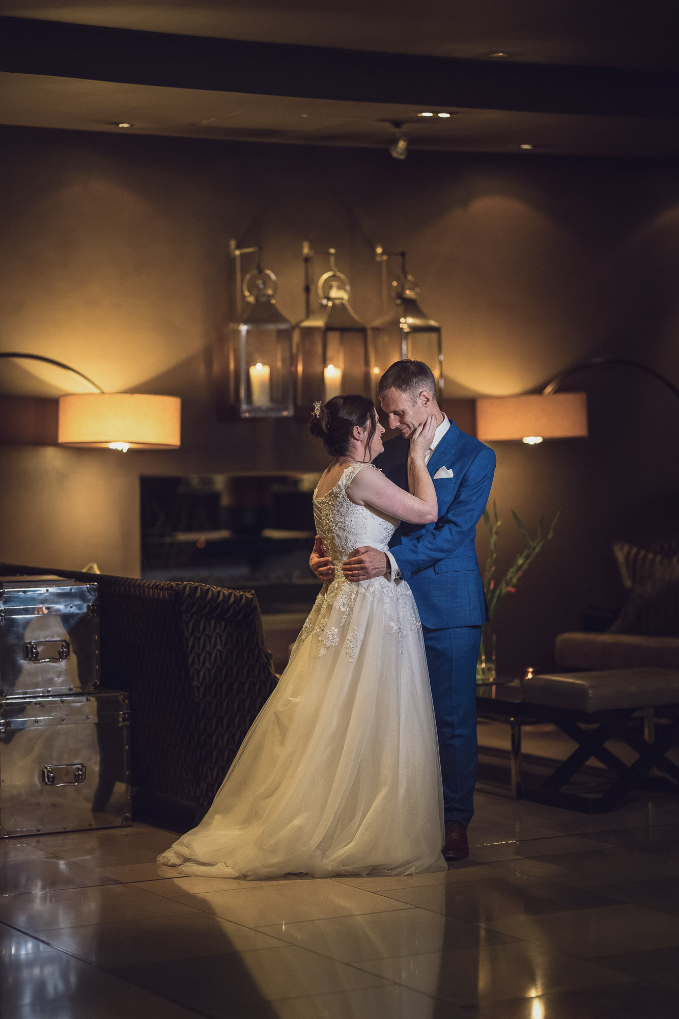 Devon wedding photography by Ember Weddings, couple in warm candlelight